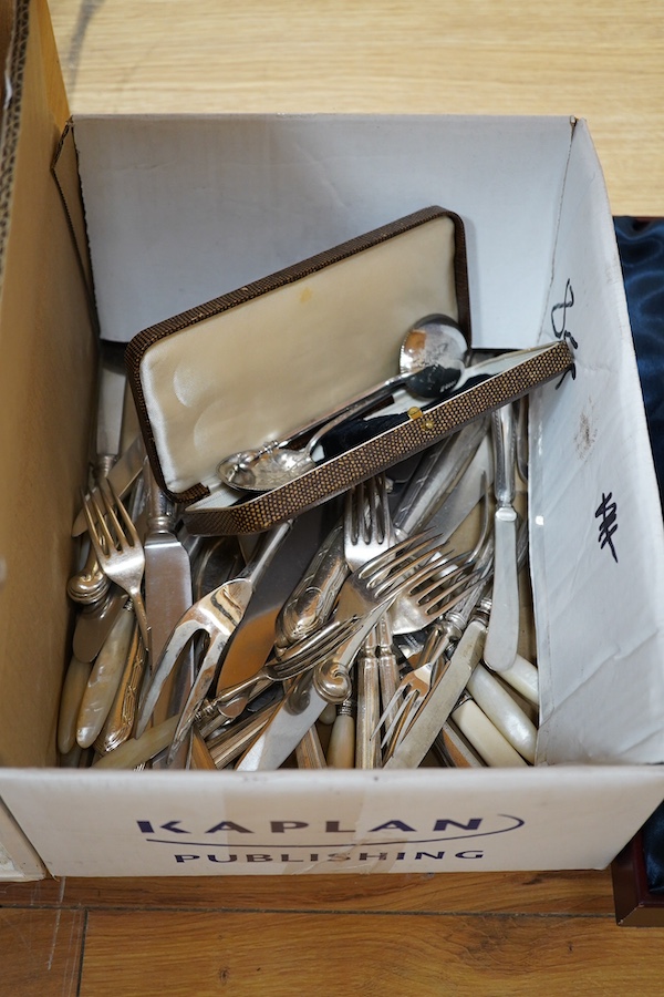 A quantity of silver plate to include cutlery, dishes, a wine coaster, etc. Condition - varies, poor to fair